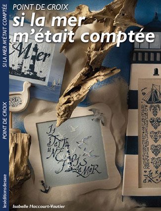 libro sul punto croce a tema mare
